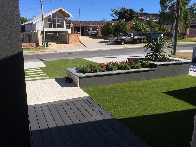 Synthetic turf and planters